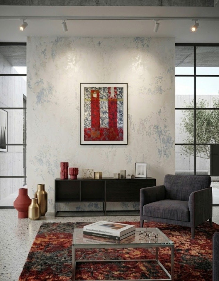 Mise en situation de Pulsation saturée par Chatti Karim. Peinture abstraite contemporaine aux tons rouges intenses et textures minérales, intégrée dans un intérieur design et épuré. Collection L'Invisible, art français.